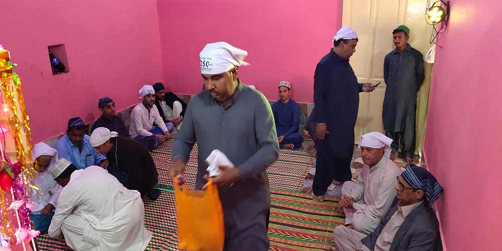 Hindu pilgrims from India reach Sadhu Bela Temple in Sindh