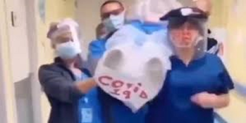 Nurses carrying coronavirus corpse and dancing video goes viral