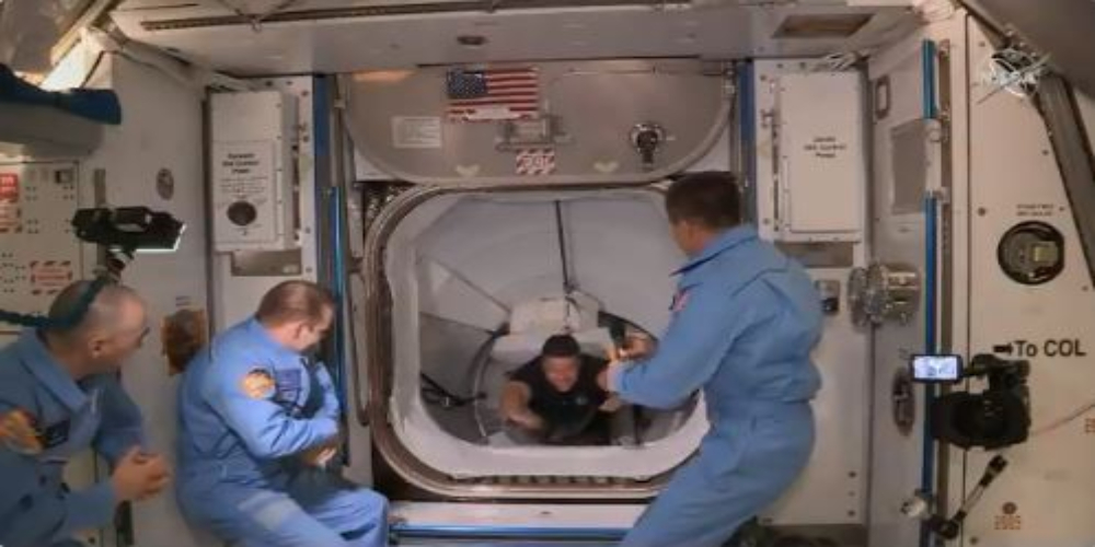 Astronauts enter space station via private air craft for the first time