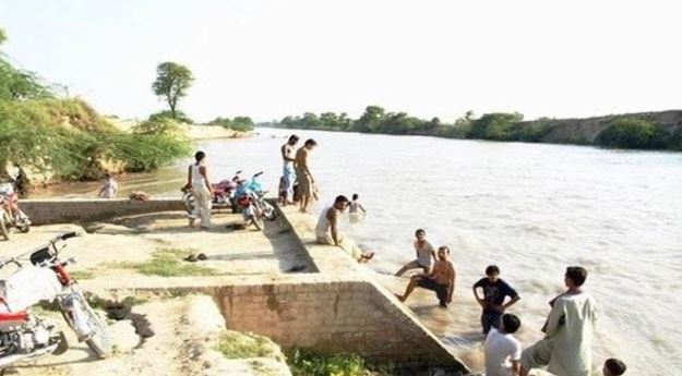 women and children thrown in canal