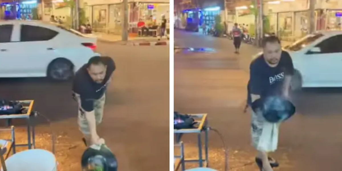 Street vendor tosses throw food from a wok to a man in viral video