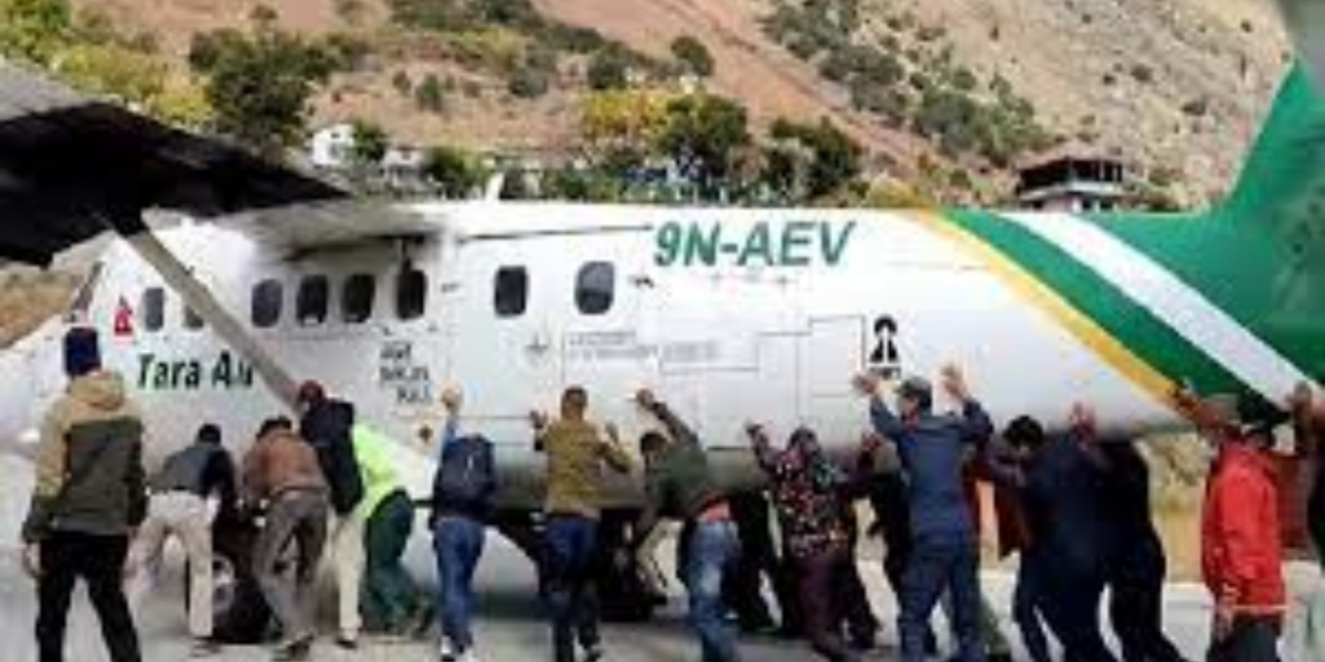 Passengers pushed the plane away from the runway after the tire had broken