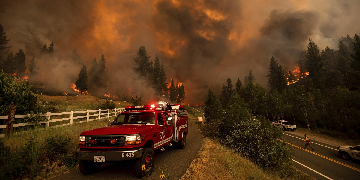 Father, son charged with starting huge California forest fire