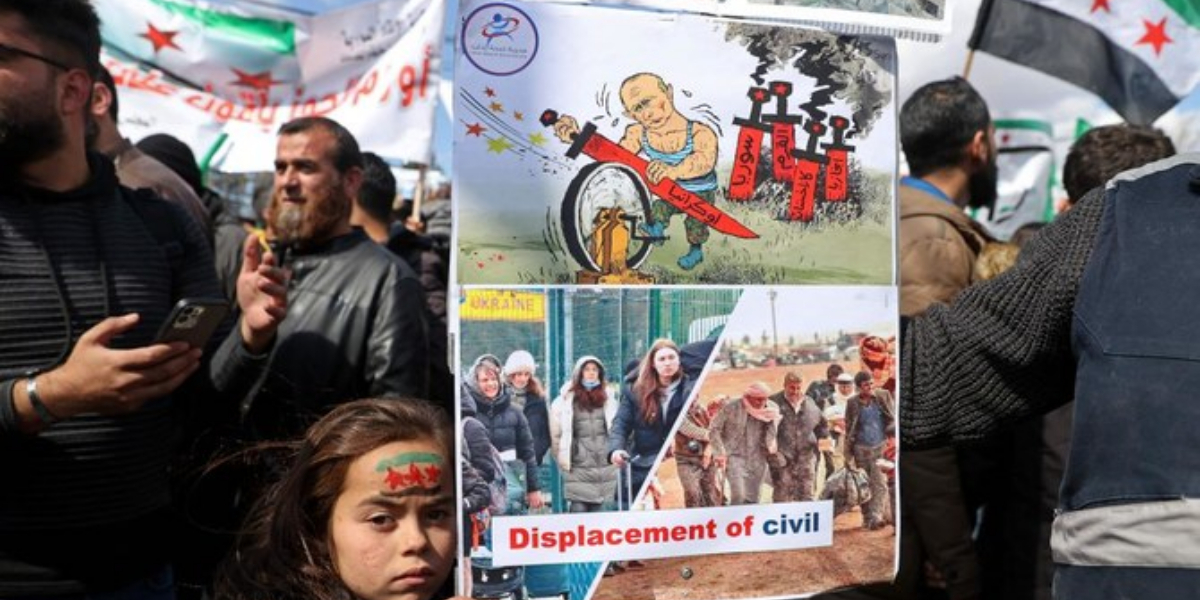 Syria enclave marks uprising with message for Ukraine