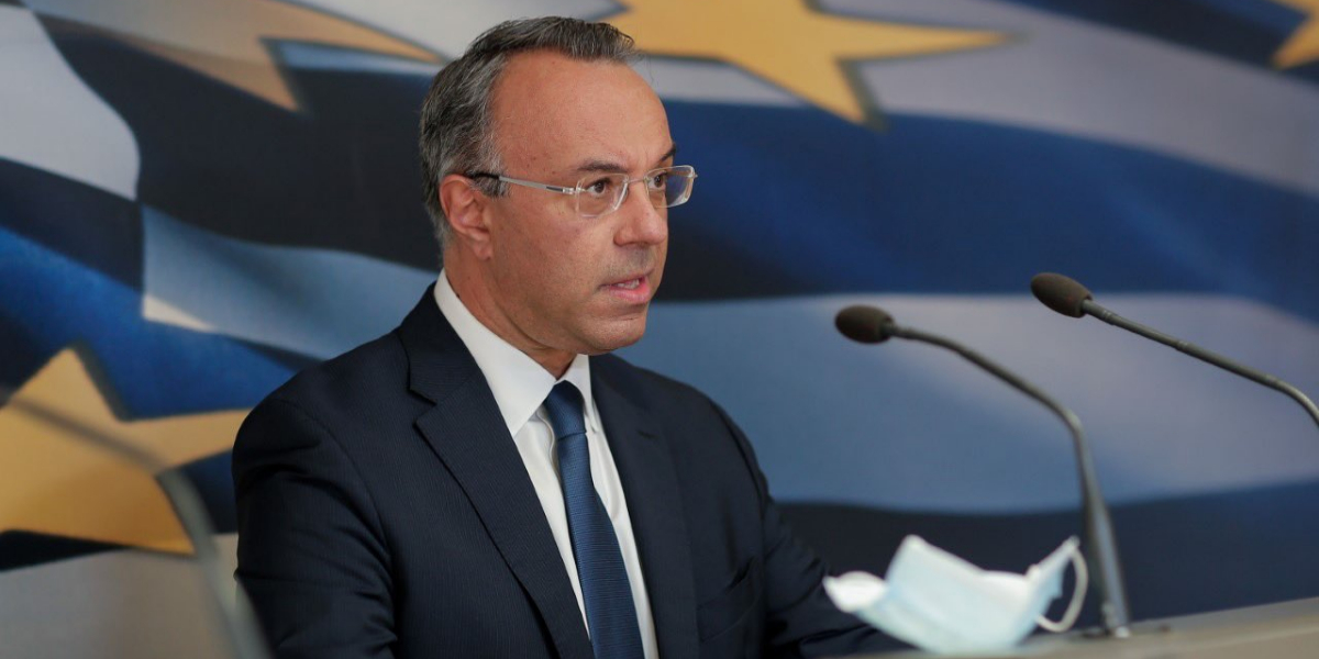 Greece repays last tranche of IMF bailout loans early, finance minister