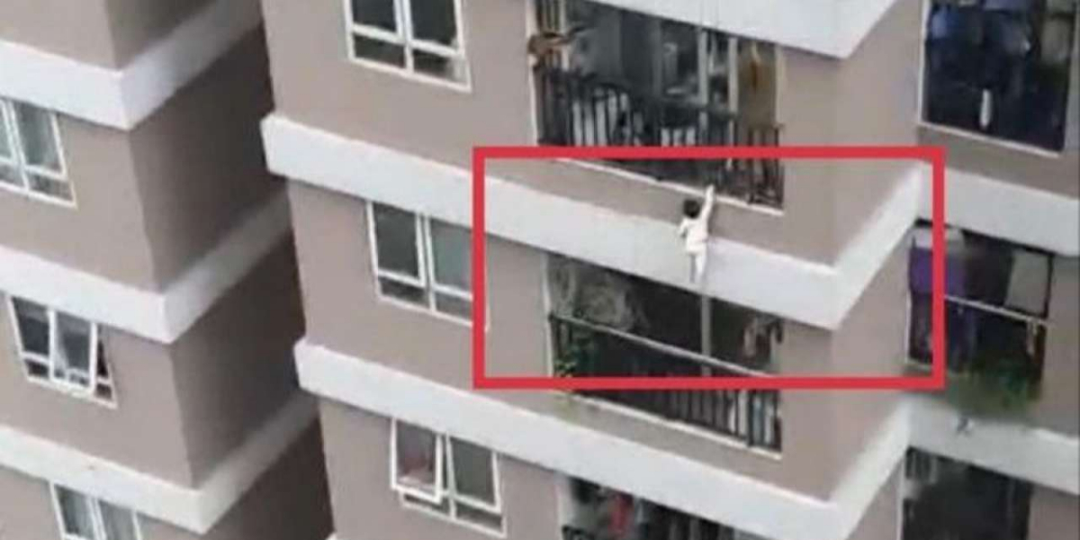 Watch: A man puts his life at risk to save a toddler from falling 100 feet
