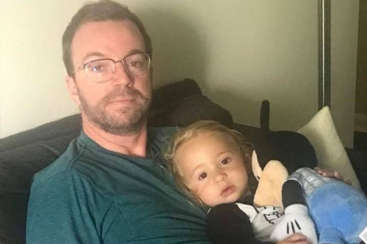 son shot by father