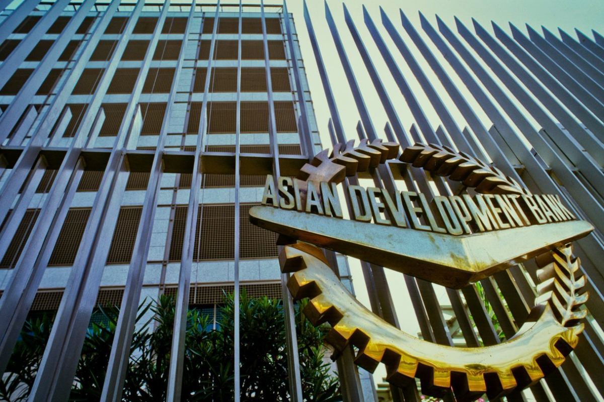 adb lowers growth prediction