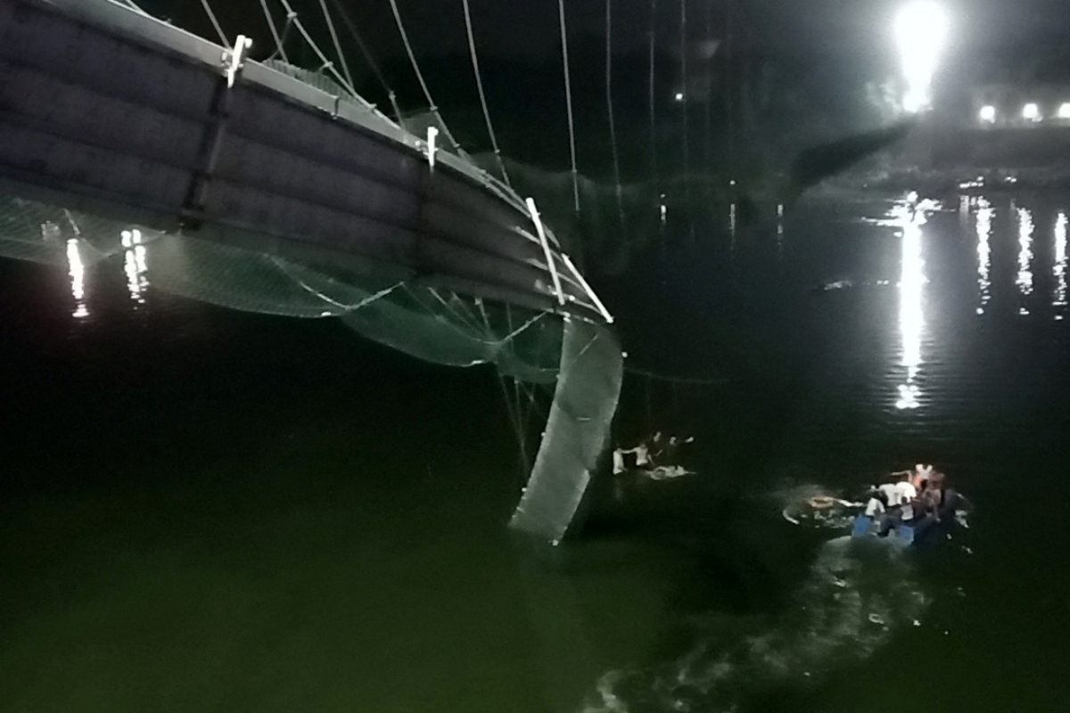 After an Indian bridge collapses, hundreds plunge into rivers