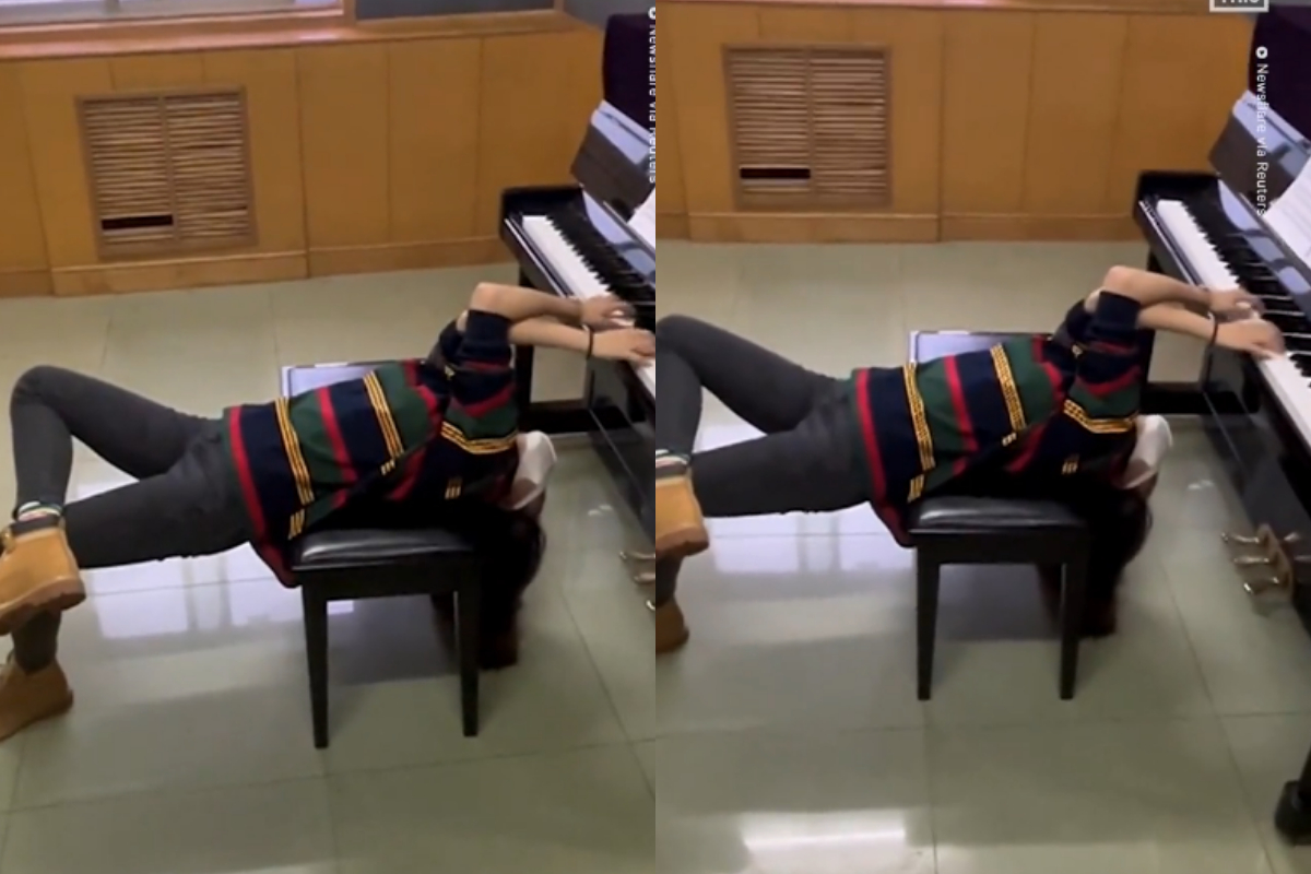 Chinese girl plays the piano