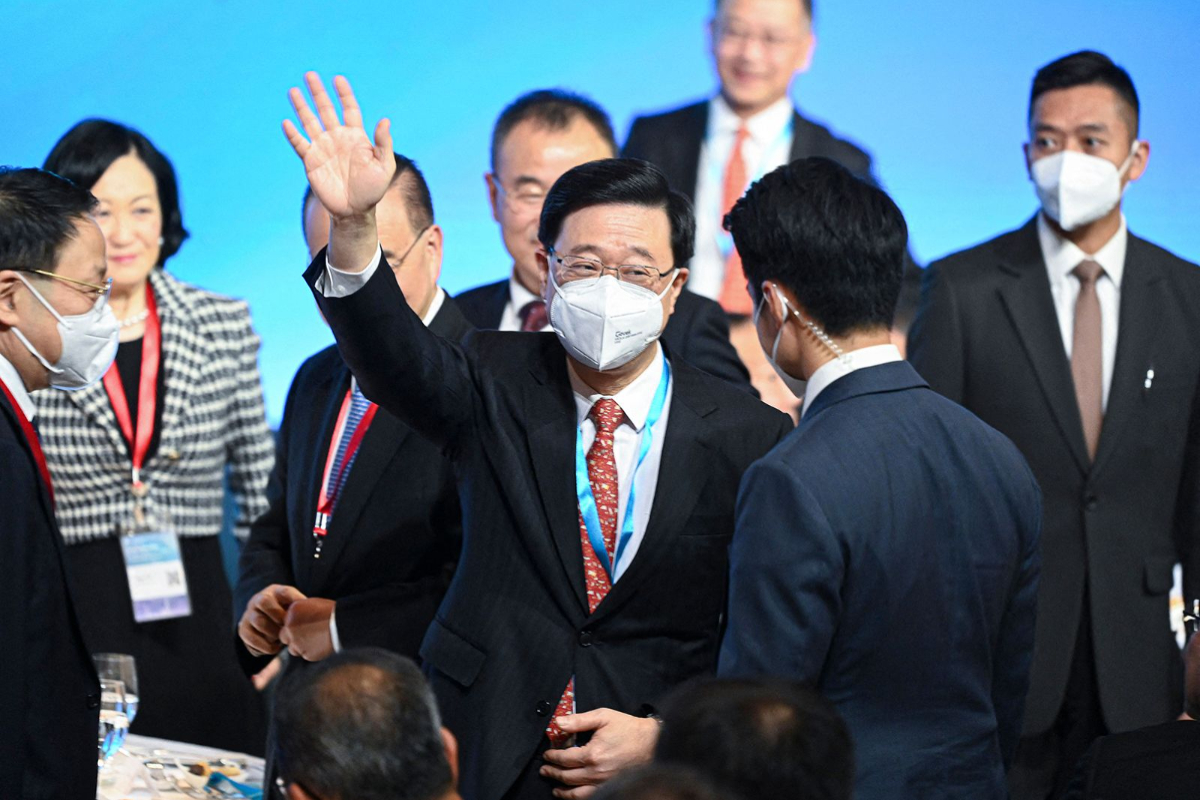 Hong Kong's leader joins Xi at APEC to boost the city's image