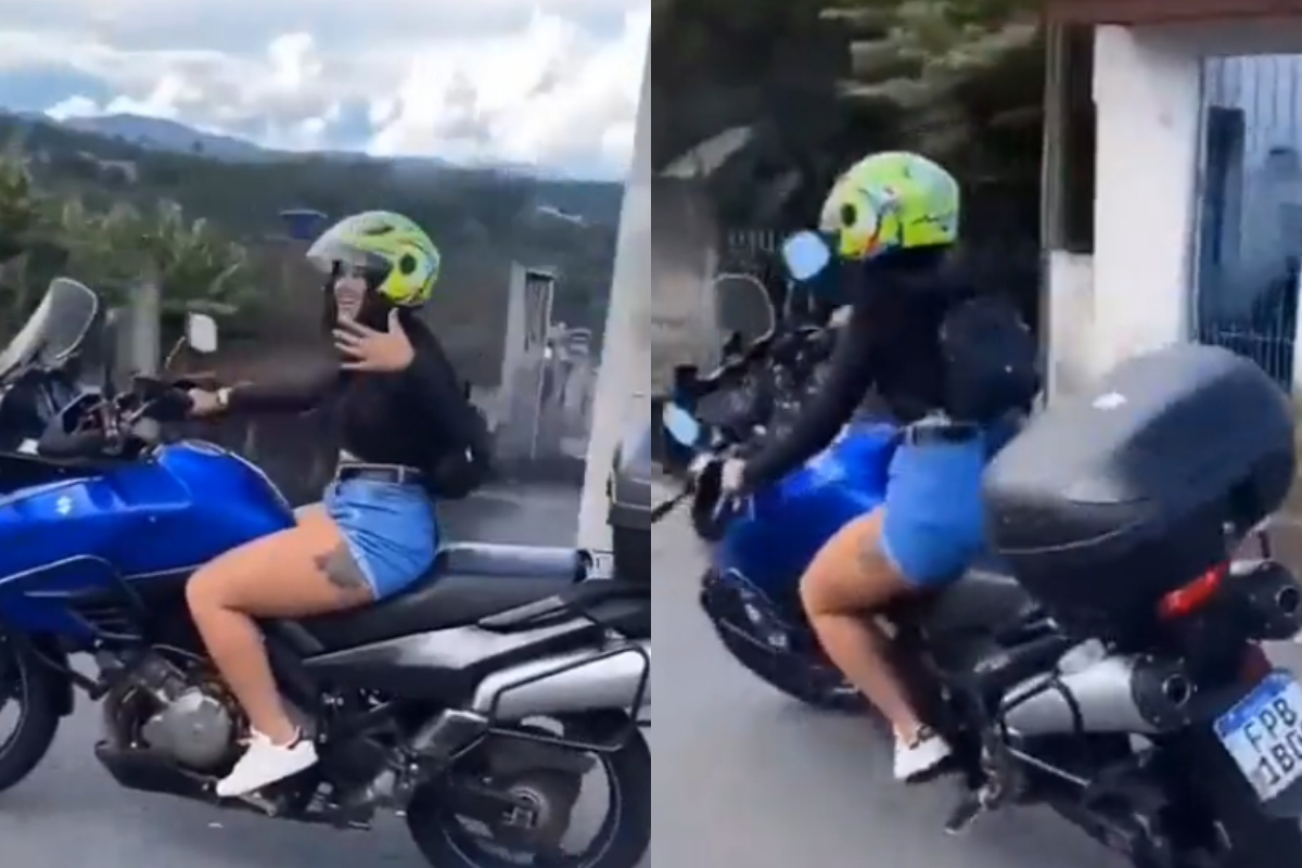 Girl rides a heavy motorbike