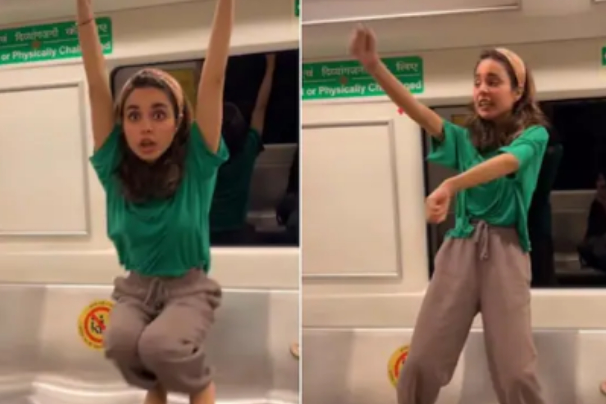 Woman dances in metro coach