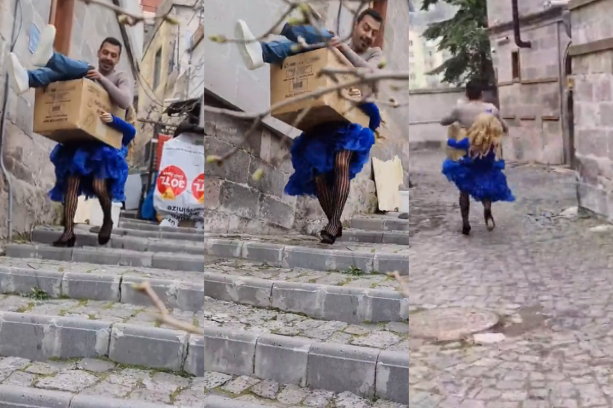 Woman picks up man