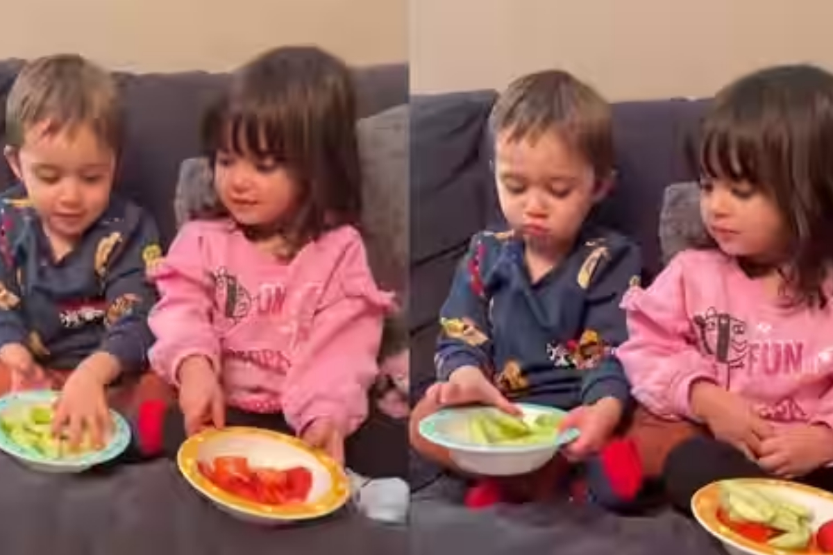 Mother feeding her twins