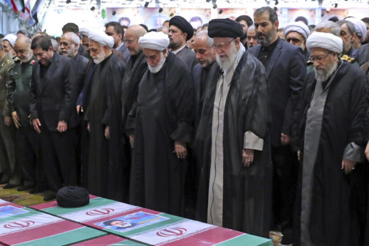 Supreme leader of Iran leads prayers at Raisi's funeral procession