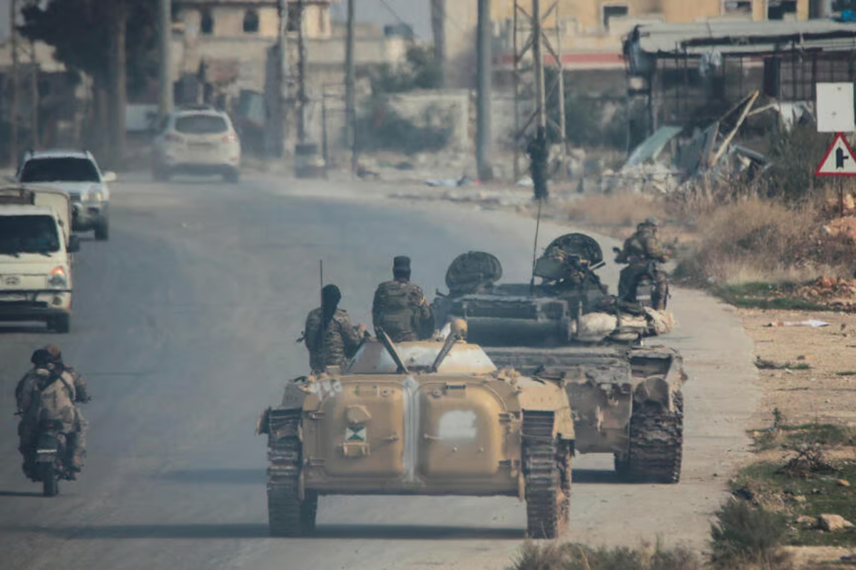 Syrian rebels sweep into Aleppo, army closes airport and roads