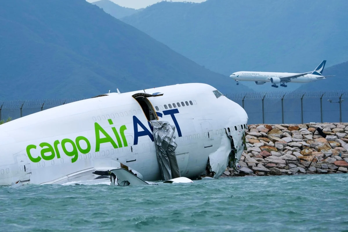 Cargo plane crashes into sea at Hong Kong airport, killing 2 on ground.