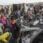 Dozens of aid seekers among 82 Palestinians killed in Israeli attacks on Gaza