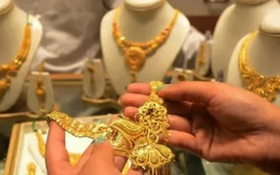 Gold prices rise in domestic and global markets