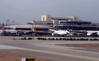 Loader vehicle crashes into parked cargo plane at Karachi Airport