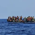 Another boat carrying 65 passengers capsizes in Libya