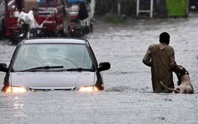 Heavy rain triggers flood alert in twin cities, schools closed