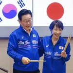 Japanese and South Korean leaders jam to K-pop hits at a summit