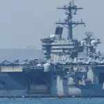 Iran warns any attack will mean 'all-out war' after Trump says US 'armada' on its way