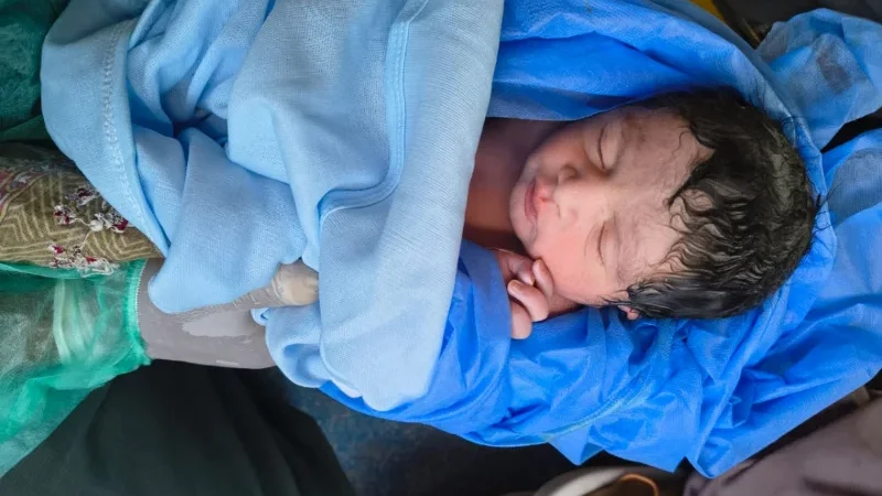 Woman gives birth