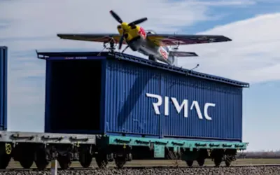 Italian pilot stuns world by landing plane on moving train in Turkey