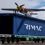 Italian pilot stuns world by landing plane on moving train in Turkey