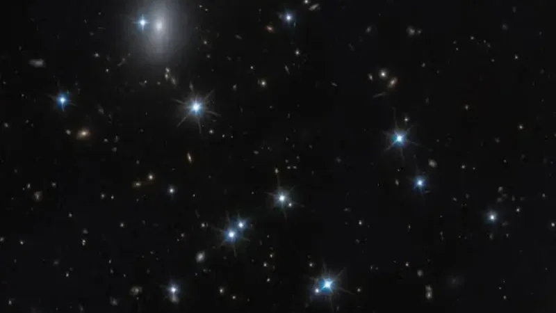 Astronomers spot nearly invisible galaxy packed with dark matter