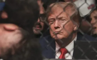 Trump watches UFC fight in Miami as US–Iran talks unfold in Islamabad