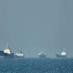 Fragile calm returns to Strait of Hormuz as US awaits Iran’s response