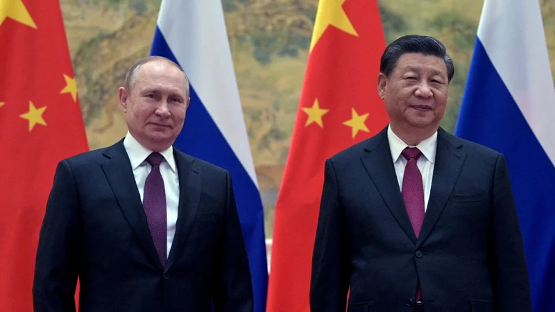 Chinese President Xi Jinping holds large-group talks with Russian President Putin