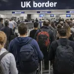 Net migration to UK falls to post pandemic level as fewer people come to Britain for work
