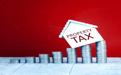 Government set to cut property taxes in new budget