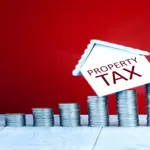 Government set to cut property taxes in new budget