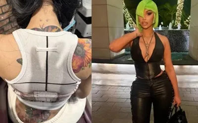 Cardi B debuts new dermal implant and neck piercing in bold black-leather look