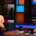 Taylor Swift stuns in $1,695 velvet minidress for "The Late Show with Stephen Colbert"