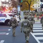 Two National Guard troops shot near White House; suspect in custody