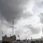 Karachi warms up under a grey sheet of sky