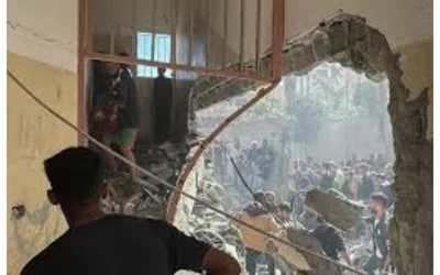 Israeli attacks on school, tents and homes kill at least 17 in Gaza