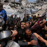 Israel pounds Gaza City, kills at least 57 across Gaza Strip