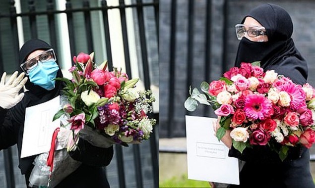 Woman Wearing Safety Goggles Delivers Flowers to Boris Johnson and Carrie Symonds