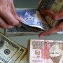 Rupee weakens 17 paisas against dollar