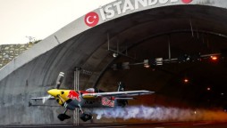 Pilot flies a plane through a road tunnel at 150 mph