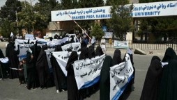 Afghan women wearing full-face veils hold rally in support of Taliban
