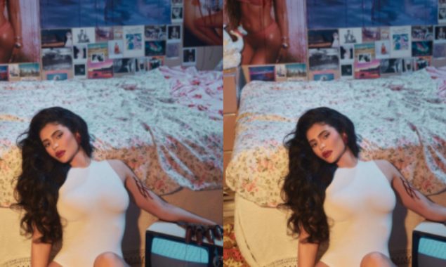 Kylie Jenner looks breathtaking in a white swimsuit with bold lips